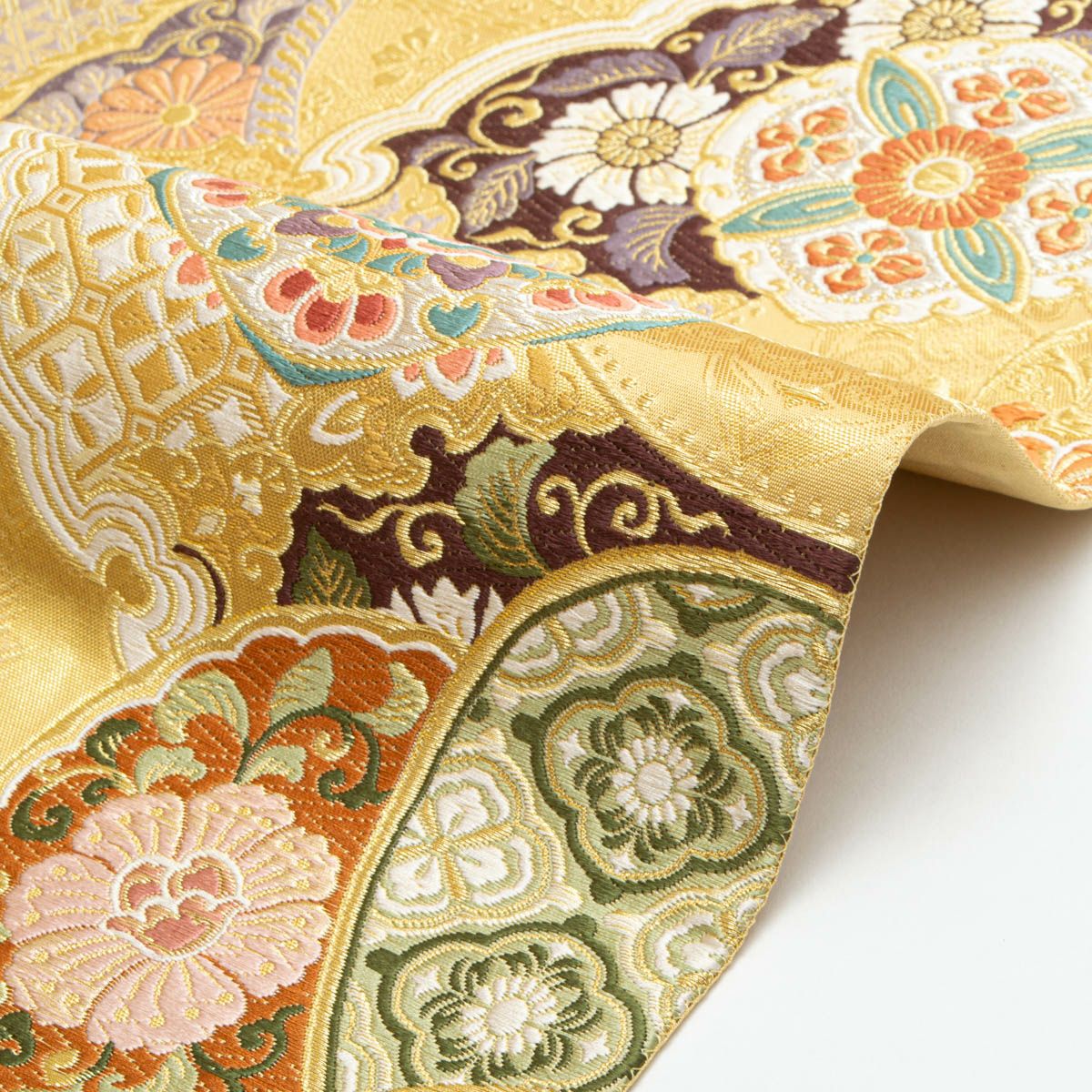 袋帯 唐織 唐花文 丸文 雪輪文 鏡裏文 重ね 金糸織 飴色 西陣織 正絹