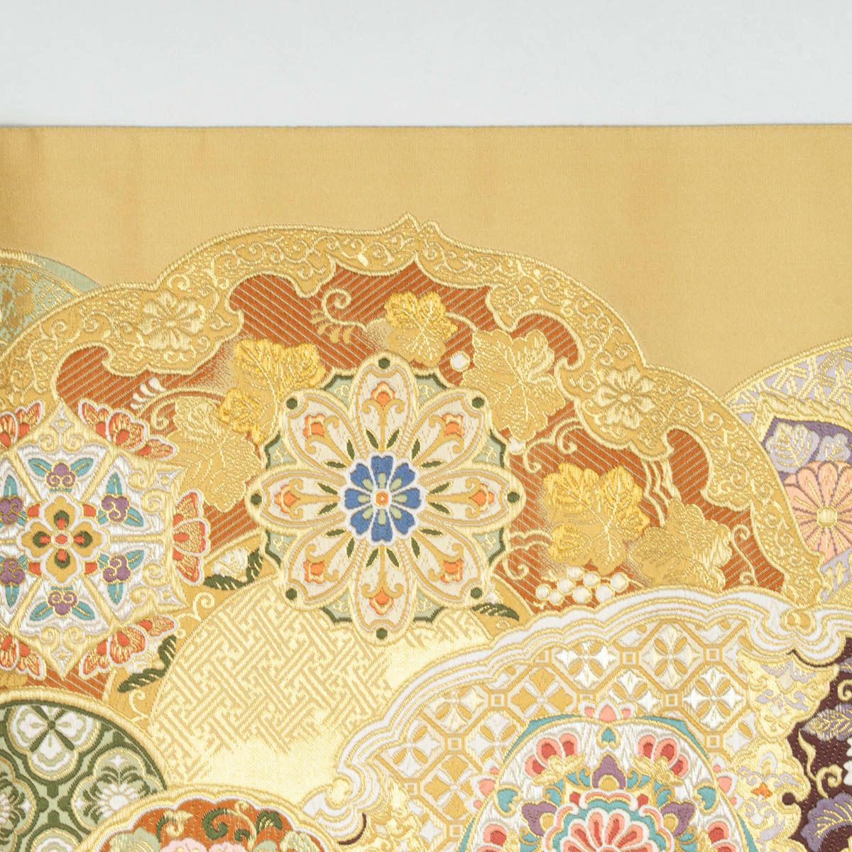 袋帯 唐織 唐花文 丸文 雪輪文 鏡裏文 重ね 金糸織 飴色 西陣織 正絹